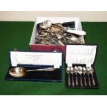 A box containing assorted cutlery