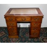 A small Victorian mahogany pedestal desk.