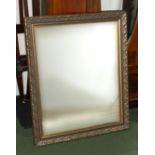 A gilt framed mirror