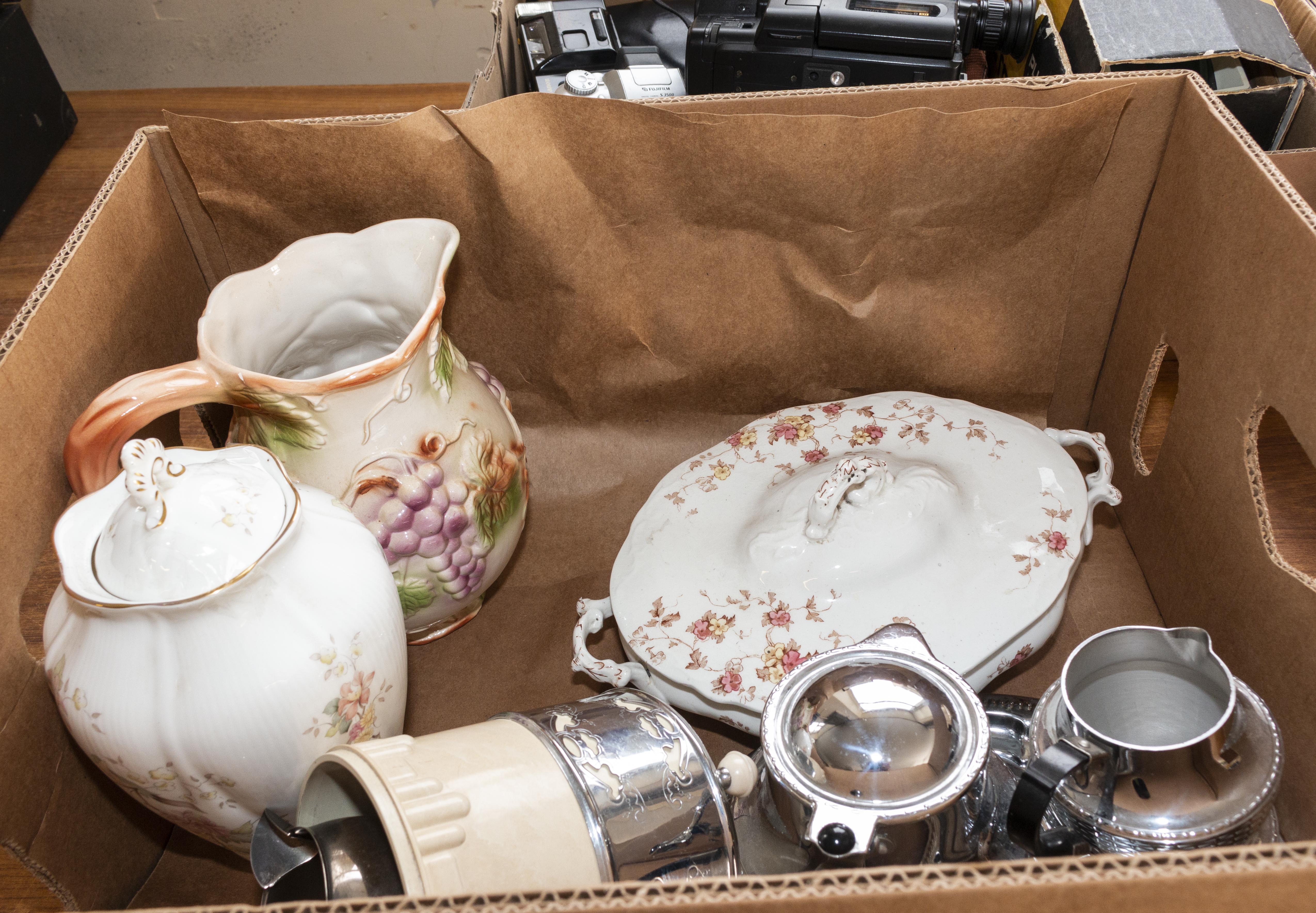 A box containing pottery items