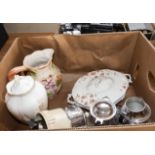 A box containing pottery items