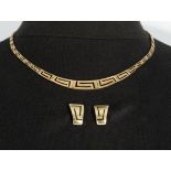 A 9ct gold necklace and matching earrings, 16gms