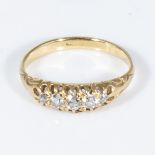 An 18ct gold ring set with diamonds, size N