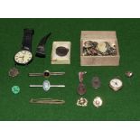 A collection of collar studs, tie pins and other items