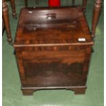 A Victorian lift top commode.