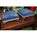 A pair of footstools