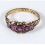 An 18ct gold ring set with amethyst, size L