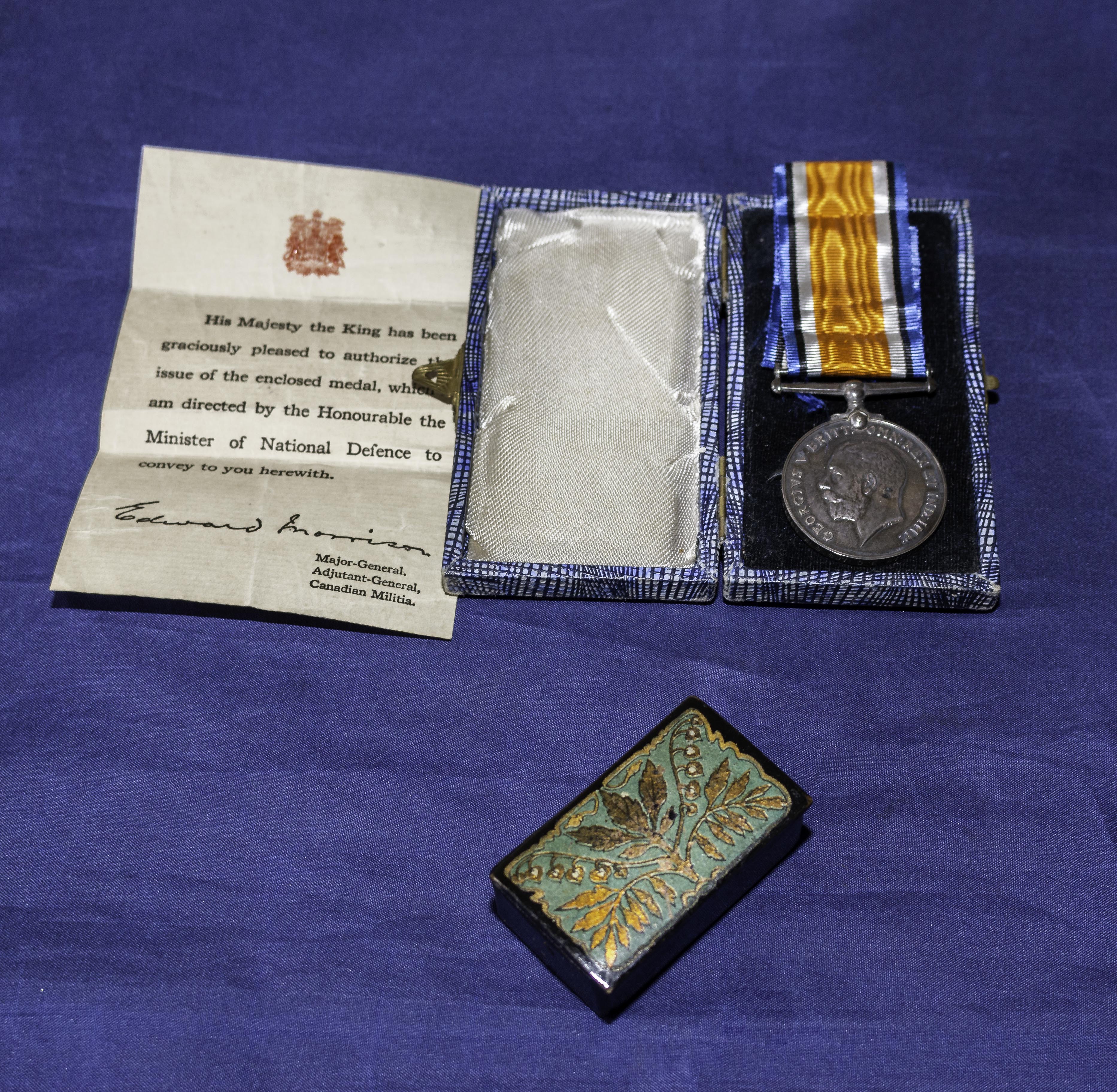 A World War I British war medal assigned to. C E Stewart with paperwork relating to Canadian Special