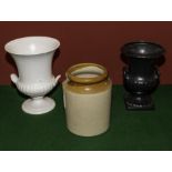 Two Wedgwood flower urns and an earthenware pot