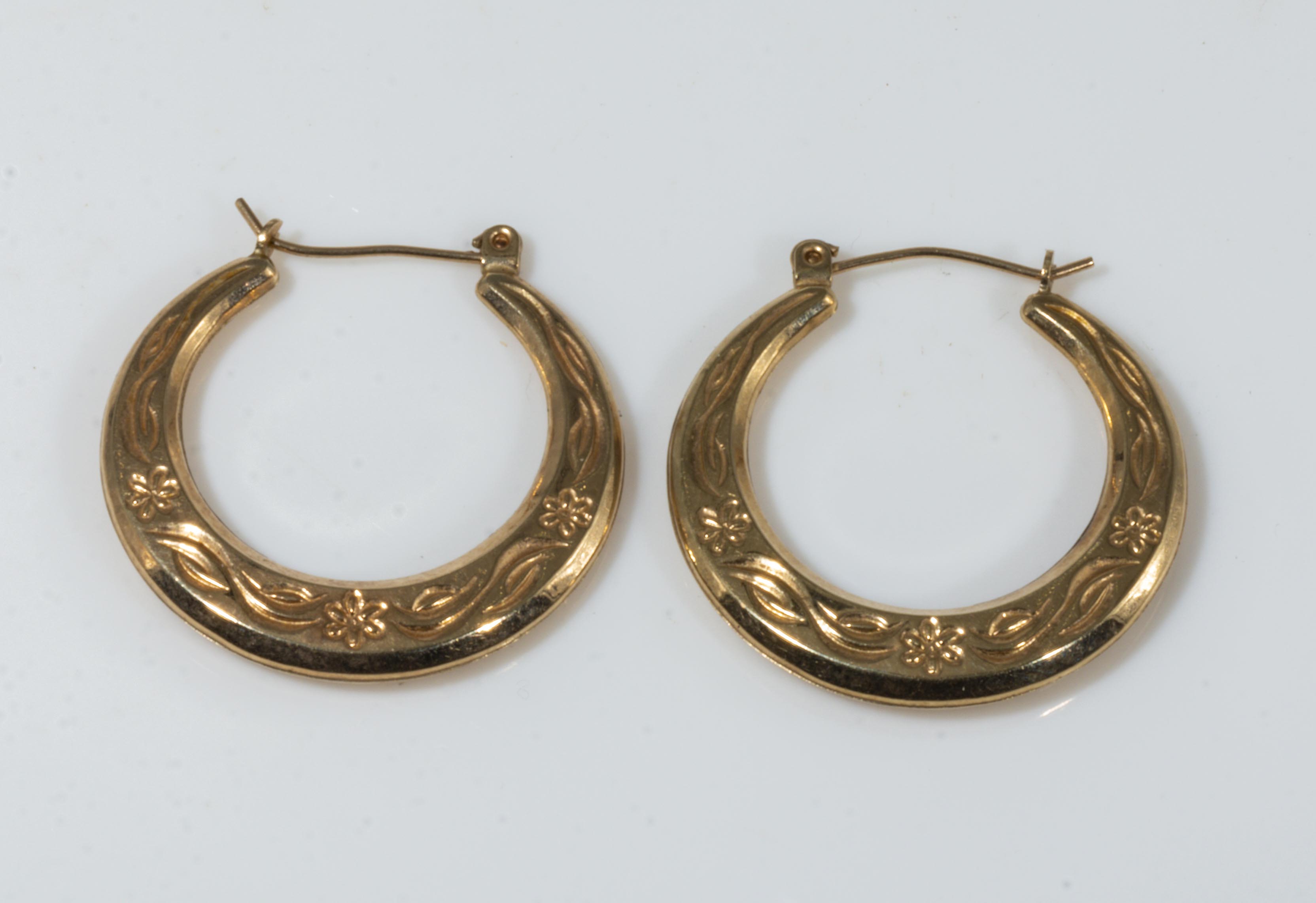 A pair of 9ct gold crescent moon earrings