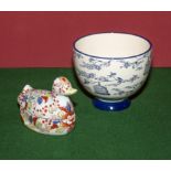A Chinese style bowl and a Chinese duck, signed
