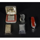 Four vintage cigarette lighters and a Swiss army knife