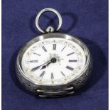 A small silver pocket watch