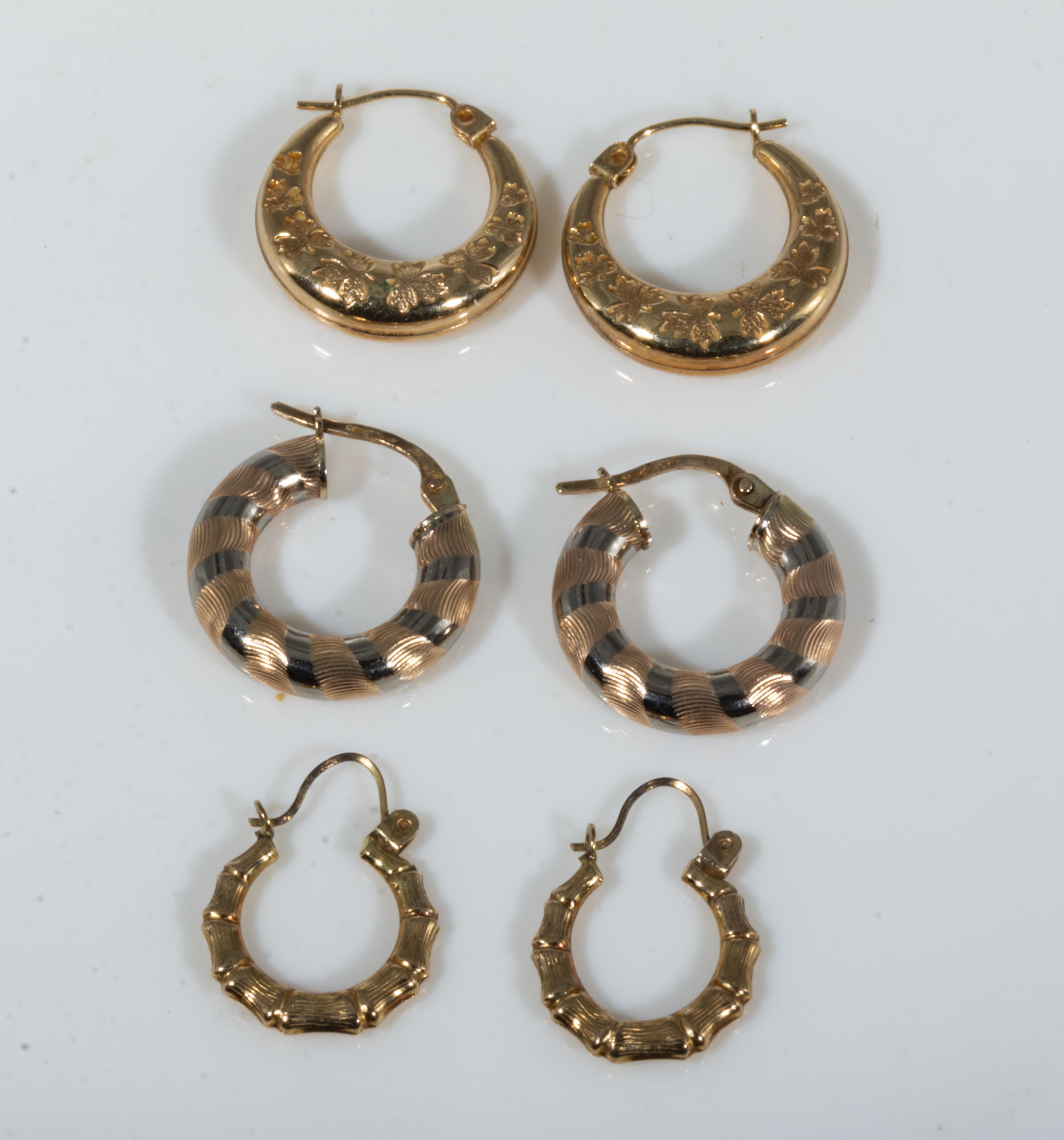 Three pairs of 9ct gold earrings