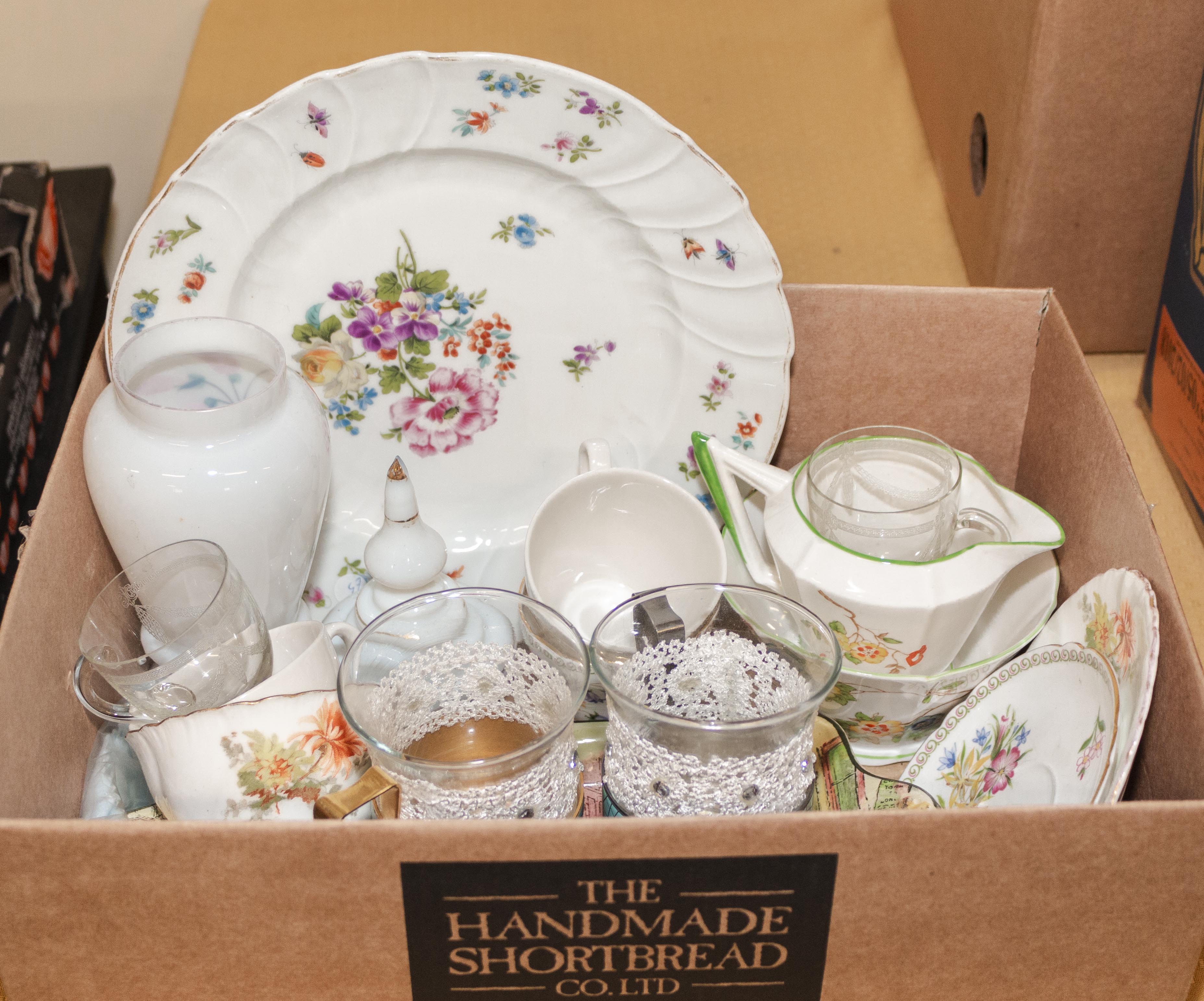 A small box of assorted China and glass