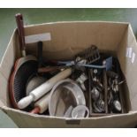 A box containing kitchen utensils