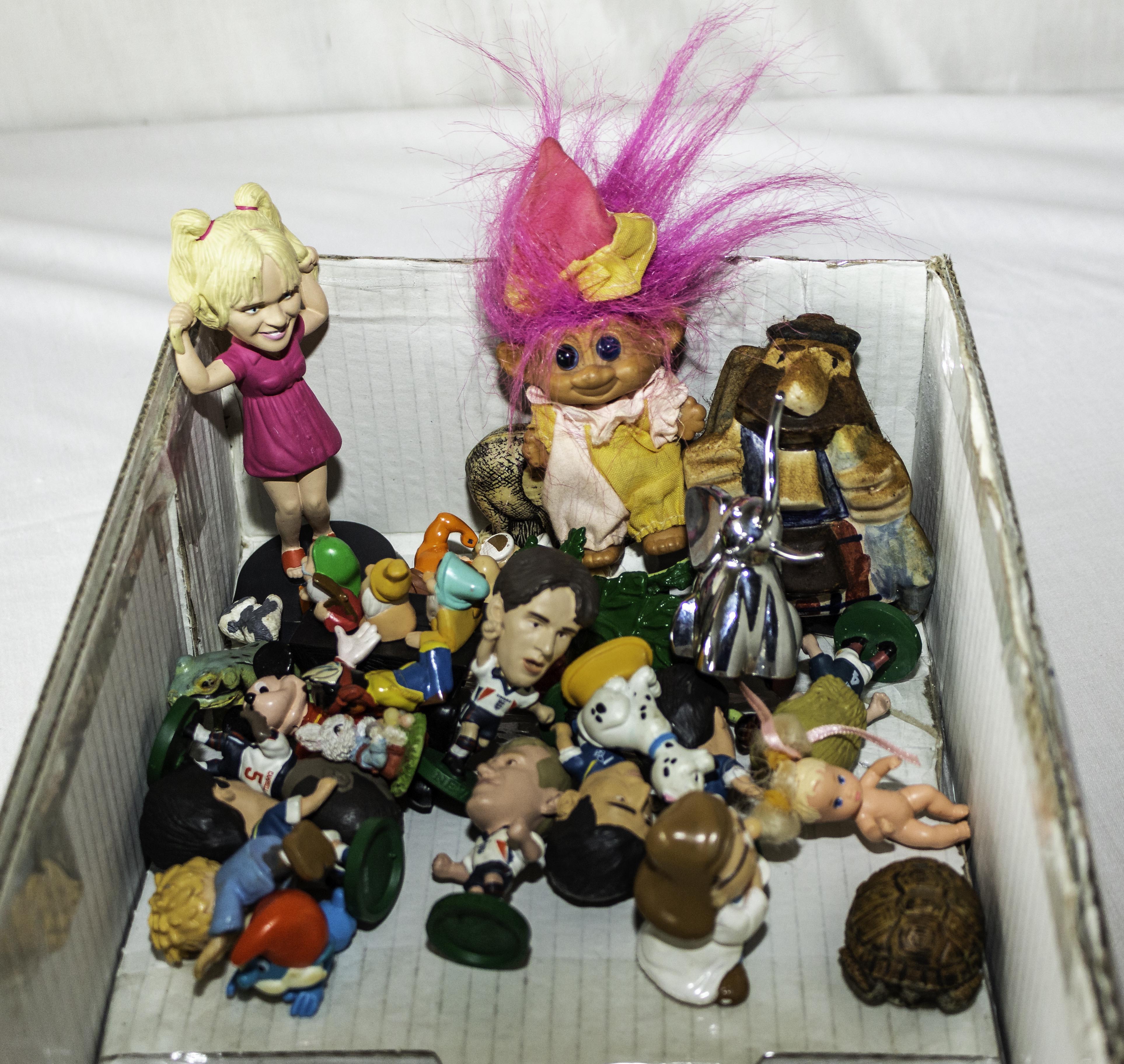 A box of miniature figures