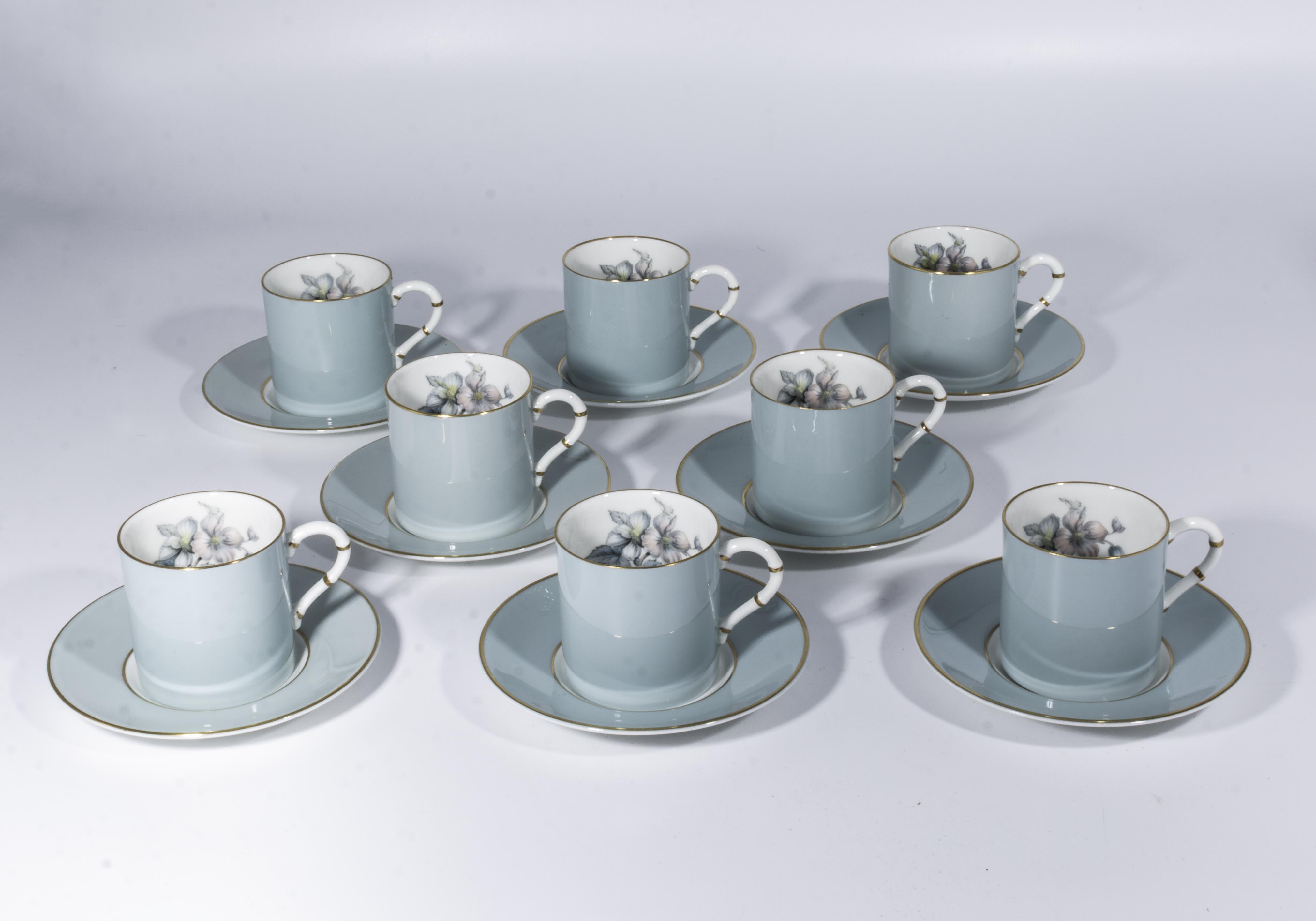 Eight Royal Worcester coffee cans and saucers