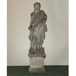 20th century reconstituted stone statue on plinth of a classic figure