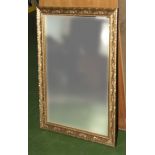 A gilt framed mirror