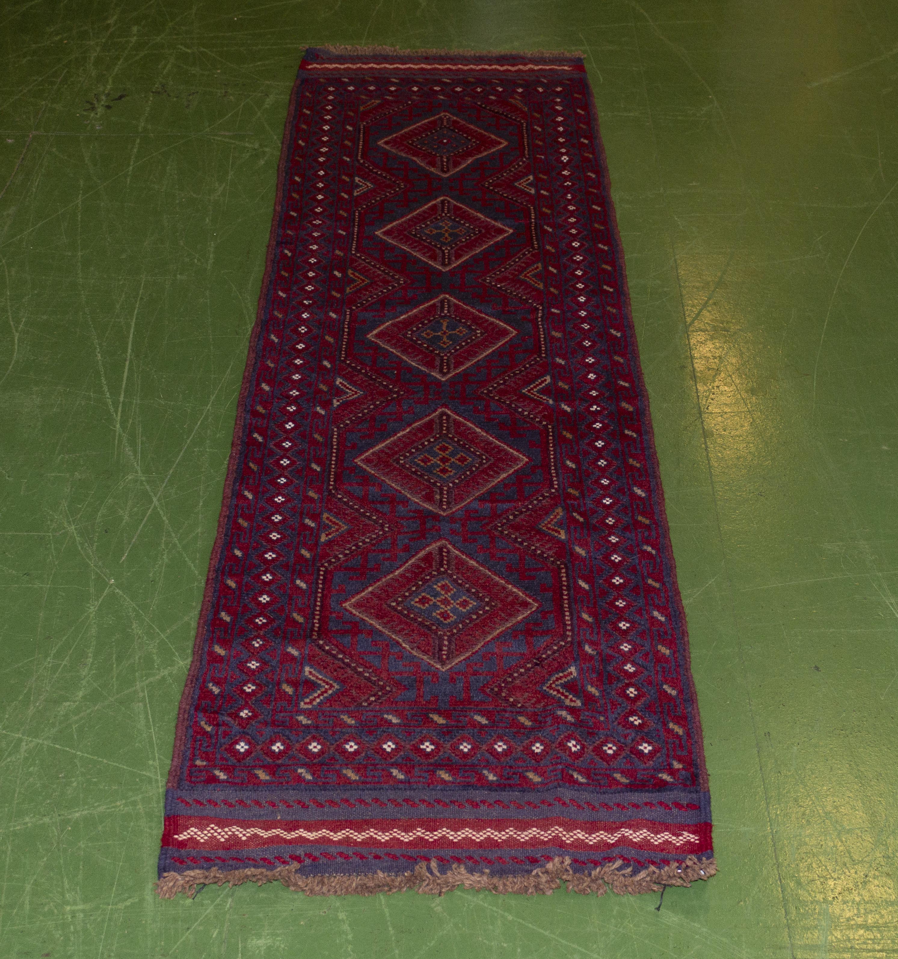 A Meshwani wool runner 250cm x 63cm