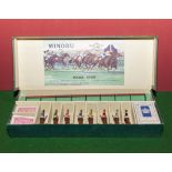 A racing game complete with lead horses. Chad valley and John Jacques Makers.