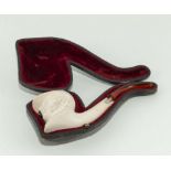 Amber tipped Meerschaum pipe in case. the bowl carved as Sherlock Holmes