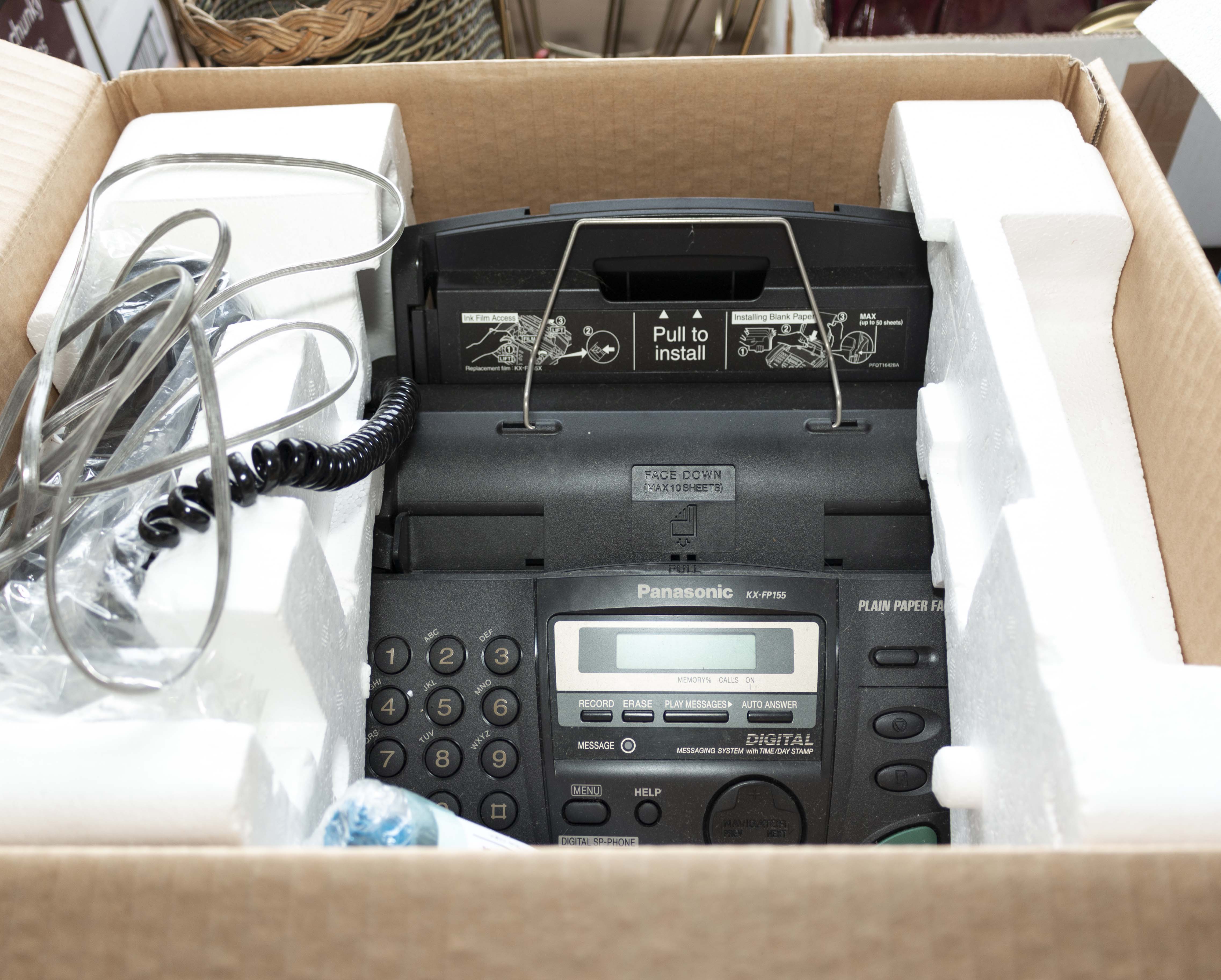 A Panasonic KX-FP155E fax machine (as new)