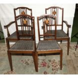 Four Edwardian inlaid mahogany chairs