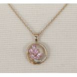 A 9ct gold chain with a gold pendant set with diamonds and pink stones