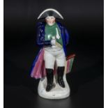 Staffordshire figure of Napoleon holding an eyeglass 8" high