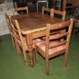 A pine kitchen table and 6 chairs