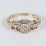 An 18ct gold diamond ring, size M