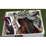 A box of trainers and shoes