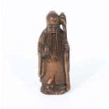 A hand carved hardwood netsuke of Chinese immortal