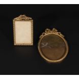 Two small ormolu frames with ribbon tops