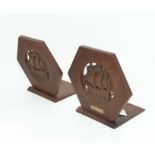 A pair of Arts and Craft Bookends with carved ships, with plaque attached From the teak of H.M.S