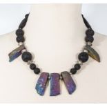 A titanium quartz silver and lava rock designer necklace