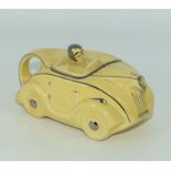 A 1930's canary yellow and silver Recite racing car teapot