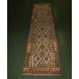 A Chobi vegetable dyed runner 310 cm x 76 cm