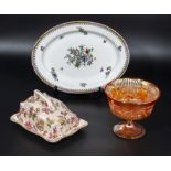 A butter dish, carnival glass bowl and a decorative serving plate