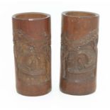 A pair of Bamboo Vases carved with figures in boats 9" high