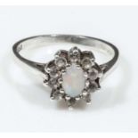 Opal and Diamond flower head set ring in white gold