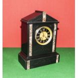 A slate mantle clock