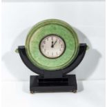 A deco Bakelite clock.