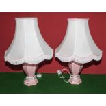 A pair of table lamps and shades