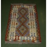 A Chobi vegetable dyed rug 128cm x 77cm