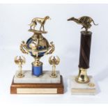 Two greyhound racing trophies