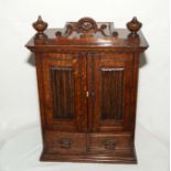 An oak smokers cabinet