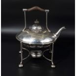 Silver plated Christopher Dresser tea kettle on burner stand with black ebony shaped handle,